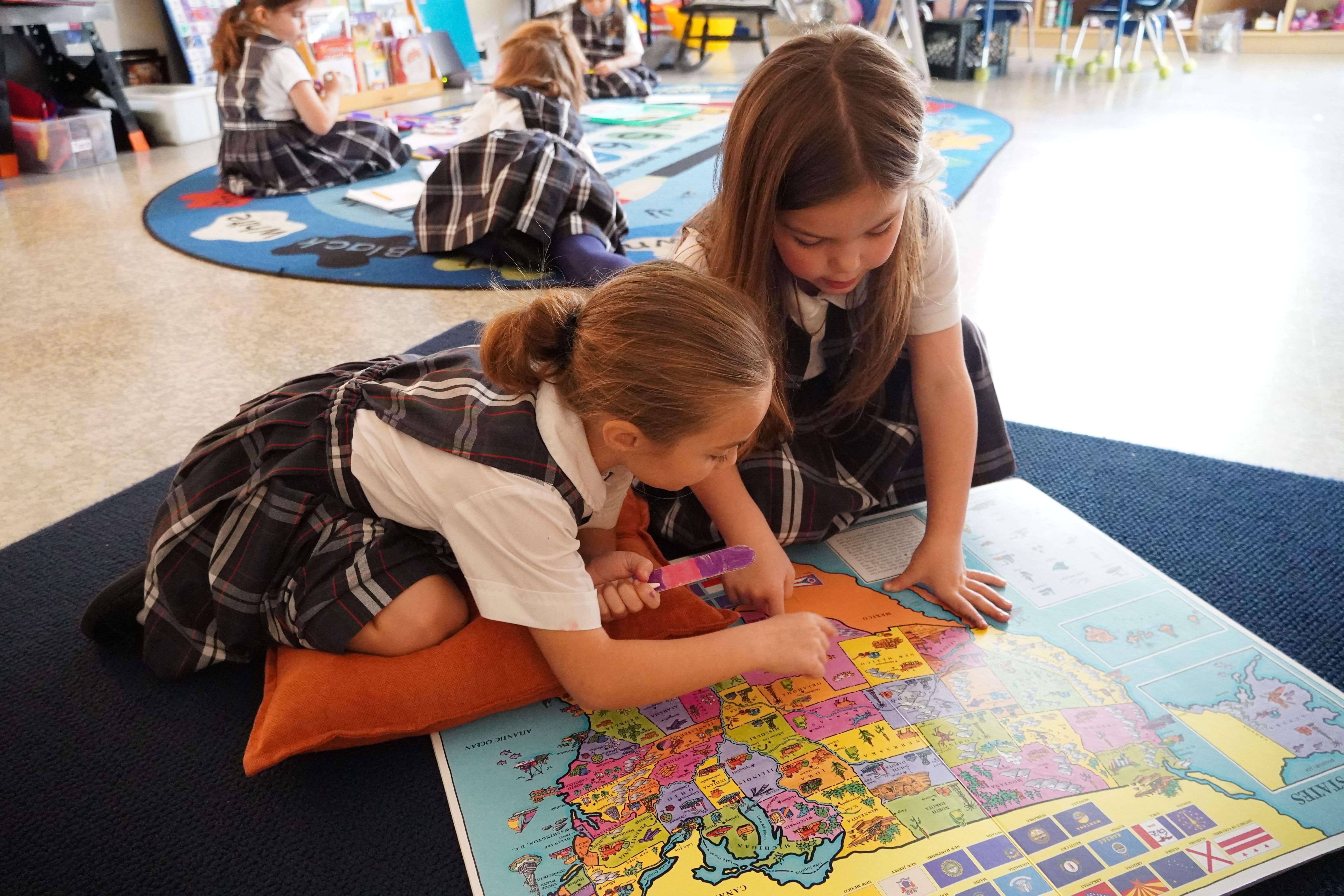 students learning about a map